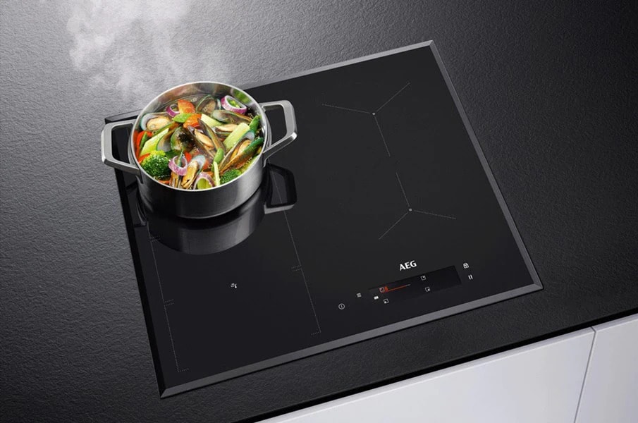 How does induction cooking work